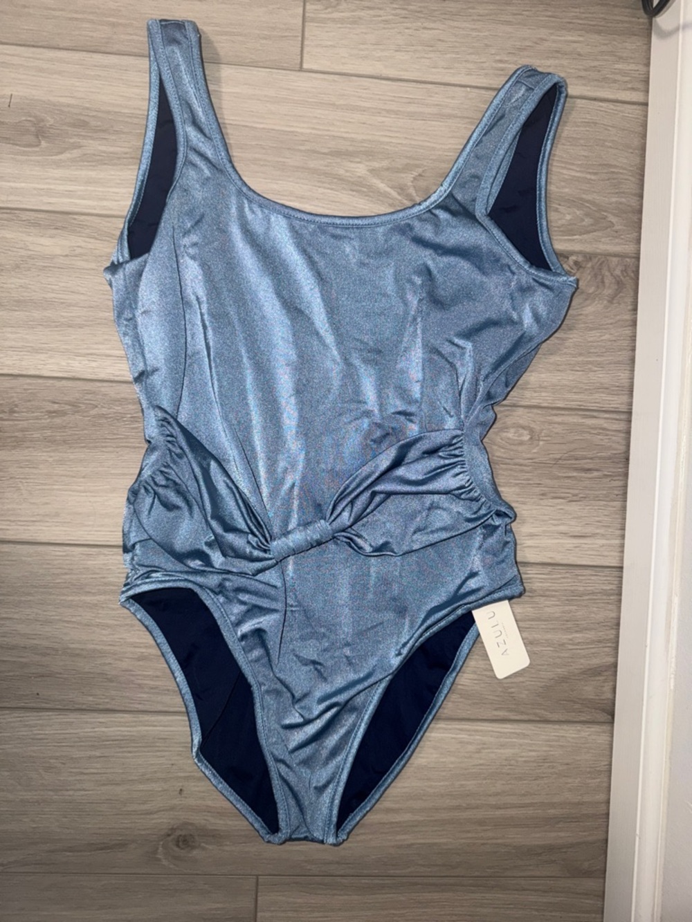 Sleek Light Blue Shimmer One-Piece Swimsuit with Twist Waist